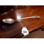 English silver basting spoon in the popular fiddle pattern. Weight 157 grams, 5 troy ounces.