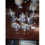 English silver five - piece tea and coffee set having plain baluster. Weight 2330 grams 74.