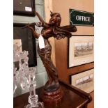 Spelter figurine of a musician.