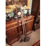 Three 19th. C. copper collection trays with turned wooden handles.