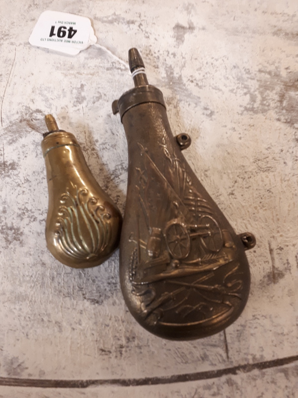 Two 19th. C. copper powder flasks.