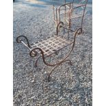 Decorative metal stool of lyre form.