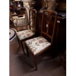 Pair of Edwardian inlaid mahogany chairs.