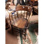 19th. C. elm and ash spindle back kitchen armchair.