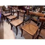 Harlequin set of six Regency rosewood dining room chairs inset with brass.