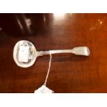 English silver sauce ladle in the popular fiddle and thread pattern . Weight 78 grams, 2.