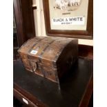 Wooden metal bound storage trunk in the Tudor style.