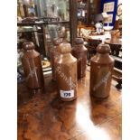 Five 19th. C. stoneware Schweppes ginger beer bottles.