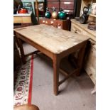 19th. C. oak kitchen table, raised on square camphered legs with single stretcher.