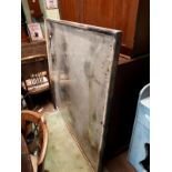 Large wooden framed wall mirror.