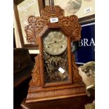 Carved oak ginger bread clock.