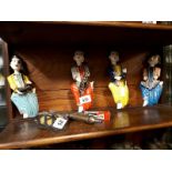 Selection of four carved wood novelty figurines.