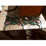 Decorative cast iron coat rack.