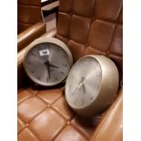 Two Gents wall clocks.