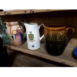 Three ceramic jugs.