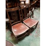 Pair of Edwardian inlaid mahogany nursing chairs.