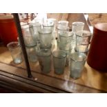 Collection of thirty ½ pint green drinking glasses.