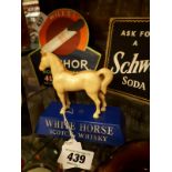 White Horse Scotch Whisky advertising figures.