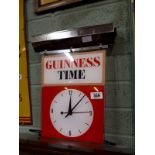 Guinness Time advertising clock.