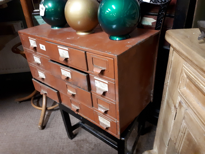 1930's metal cabinet with twelve drawers.