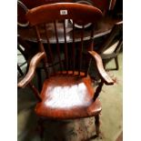 19th C. pine kitchen arm chair on turned legs.