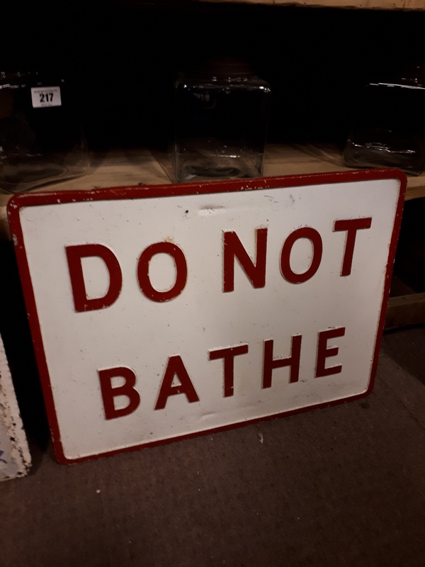 Do Not Bathe alloy sign.