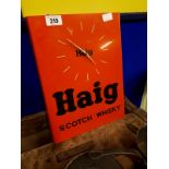 Haig Scotch Whiskey advertising clock.