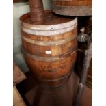 Forty gallon oak metal bound barrel. { Will be sold with the option on the following two lots } .