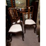 Pair of Edwardian mahogany inlaid side chairs.