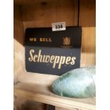 We Sell Schweppes show card.