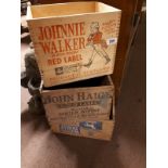 Three wooden advertising boxes - Johnnie Walker, J Haig Scotch Whiskey and White Horse.