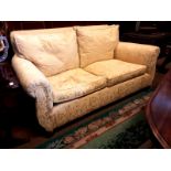 Upholstered two seater couch.