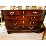 Georgian mahogany chest with two short drawers over three long graduated drawers raised on bracket