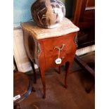 Pair of French bedside lockers with sienna marble tops and inlaid kingwood.