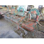 Set of four metal garden chairs.