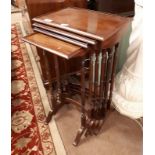 Edwardian nest of four tables in the Chippendale style.