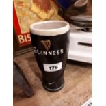 Guinness Ruberoid pint glass advertisement.