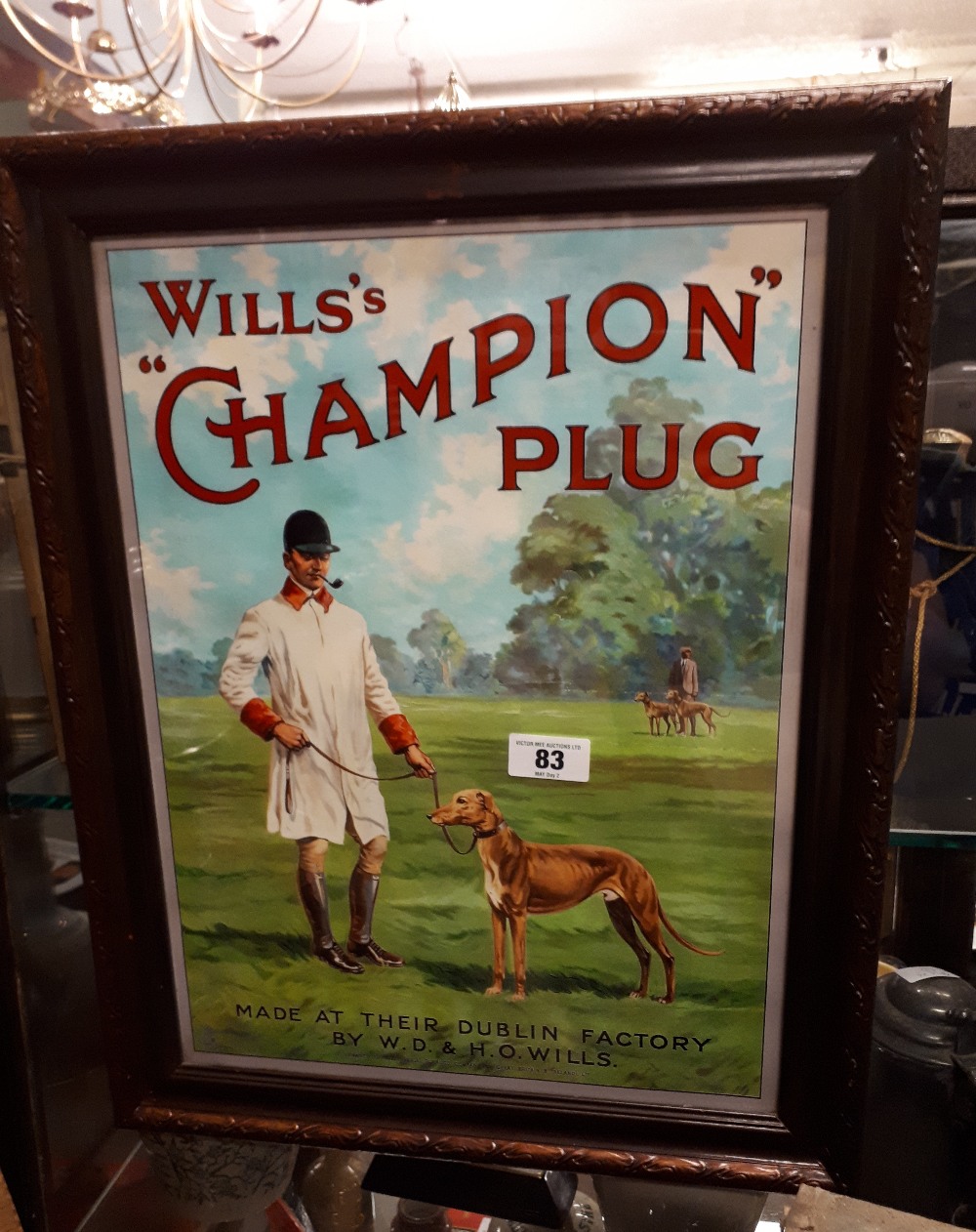 Framed Will's Champion Plug advertisement.