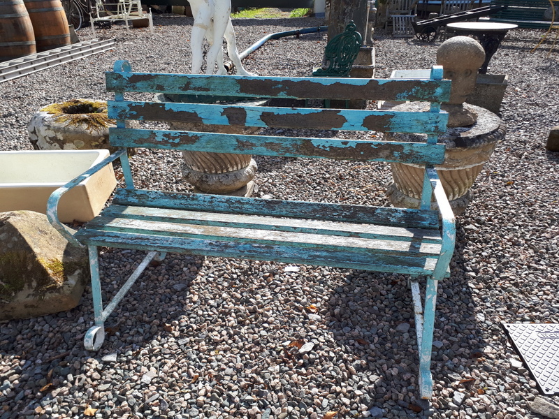 Wrought iron and wood garden seat.