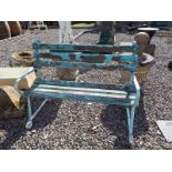 Wrought iron and wood garden seat.