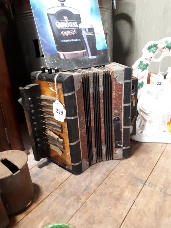 Early 20th C. button accordion.