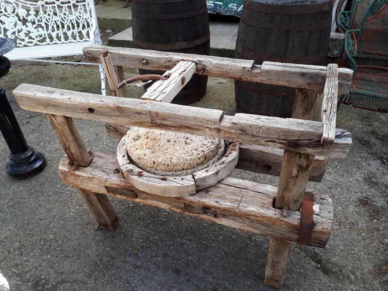 Rare 18th. C. quern stone on stand.