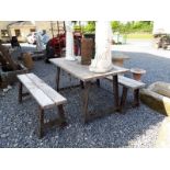 Wooden table with two benches.