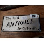 The Best Antiques Are Sold Here cast iron plaque.