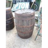 Oak metal banded forty gallon beer barrel.