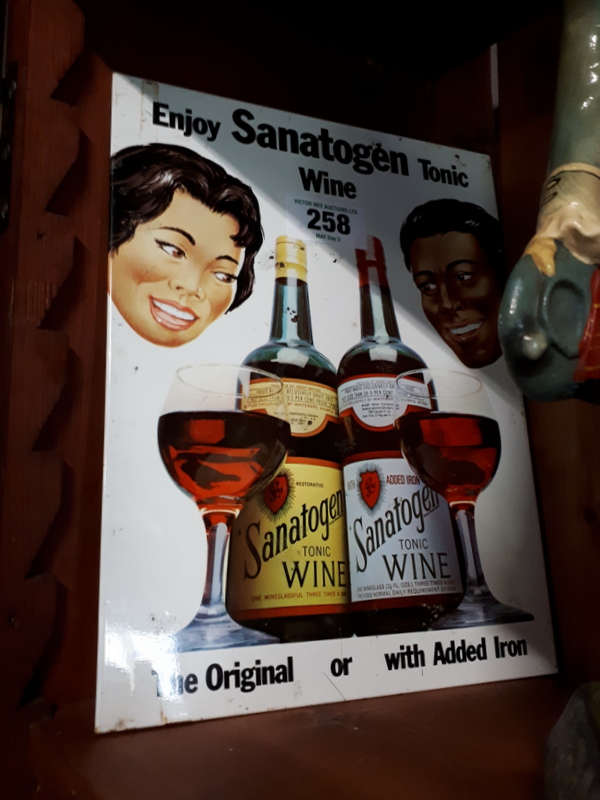 Enjoy Sanatogen Tonic Wine celluloid advertisement.