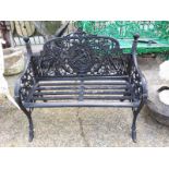 Decorative cast iron two seater garden bench.