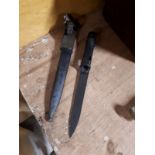 Two Belgium bayonets in original scabbards.