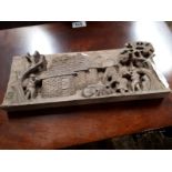 Oriental carved wooden plaque.