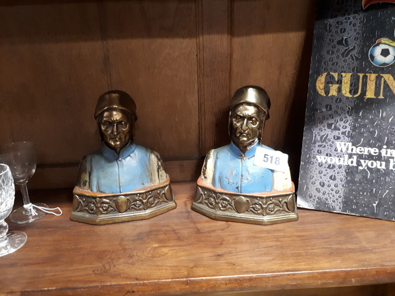 Two Art Deco style painted brass models of Dan